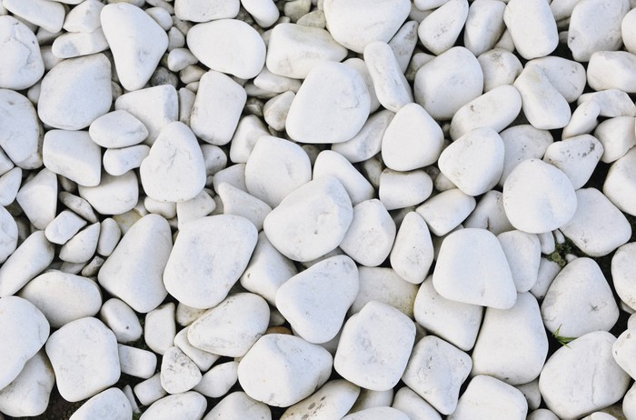Background Texture white river stones top view